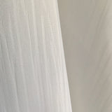 Mustergewebter Gardinenstoff aus recycelten Polyester in der Farbe creme