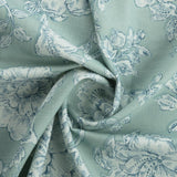 Bio Polsterstoff mit Blumen in der Farbe ice green