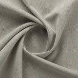 Bekleidungsstoff aus recycelter Baumwolle mit Jacquard Fischgrat Musterung in resadagrün